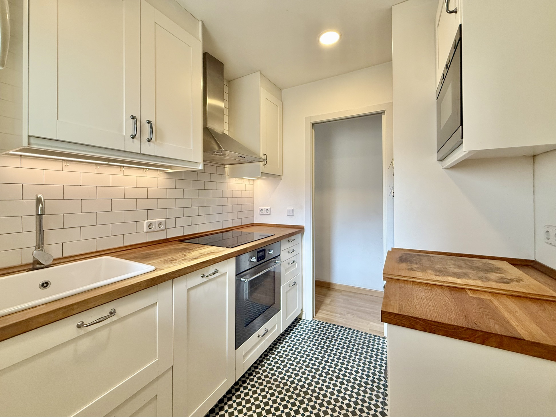 Cocina reformada del ático en Cornellà